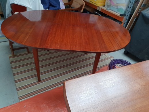 Wine table, oval with ebonized finish & Chinese red to top edge